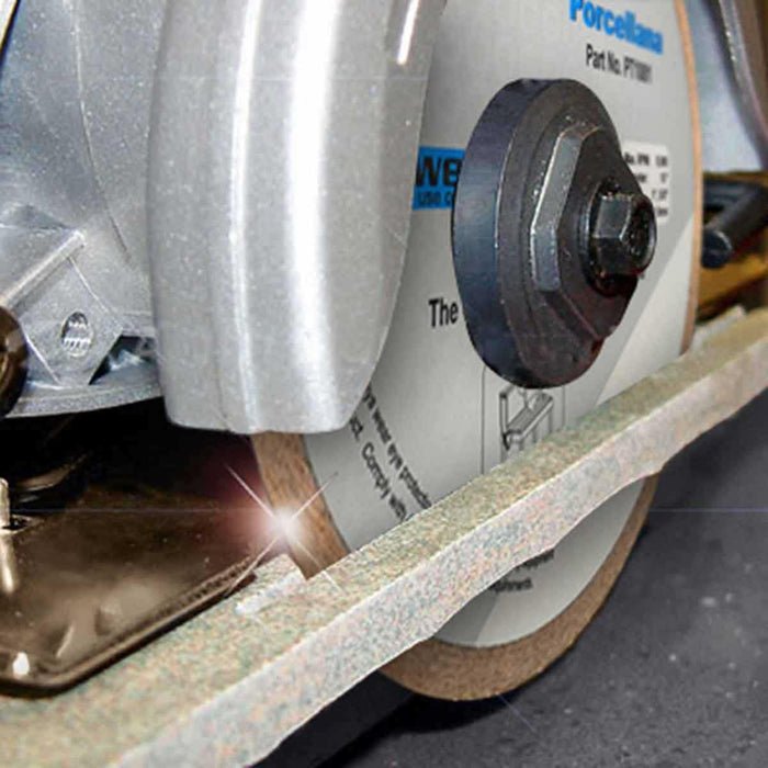 Wet cutting diamond blade with circular rim and center hub, grinding edge visible