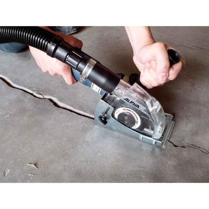 Dust collection cover with clear shroud attached to angle grinder dust extraction hose
