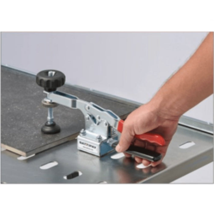 B-LOCK 90262 tile locking tool in use on floor tile, red handle