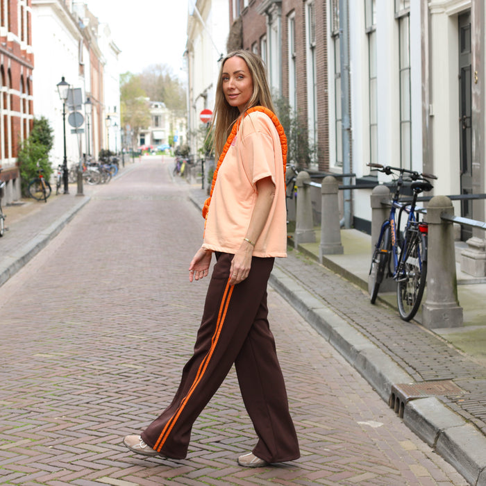 Bruine broek streep oranje