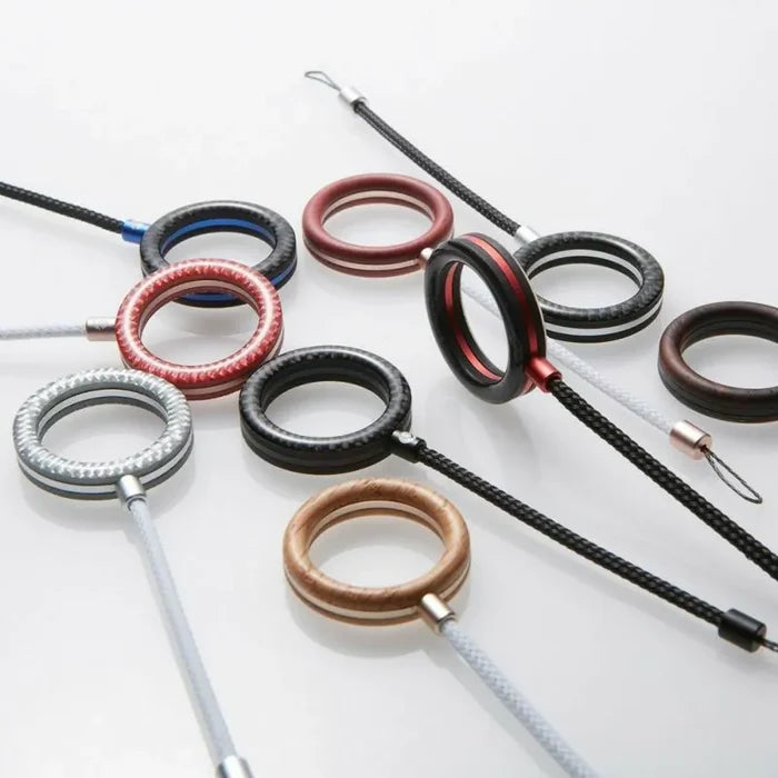 Finger ring strap phone grip in aluminum and carbon fiber — DEFF
