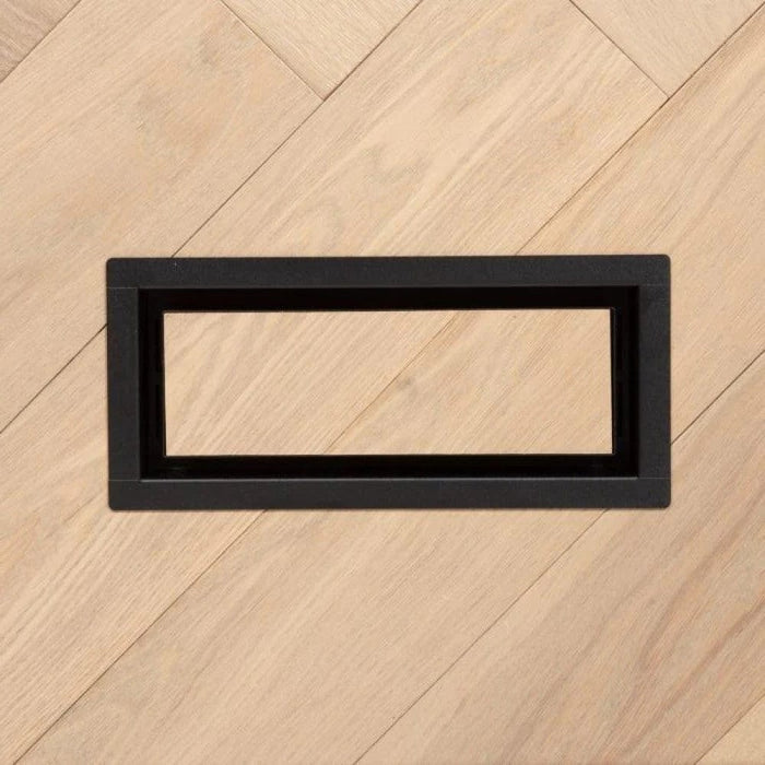 Dark framed floor vent insert with rectangular opening