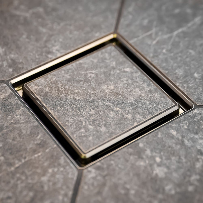 FloFX Tile-In Drain Grate in Satin Gold finish for compatible FloFX shower drain