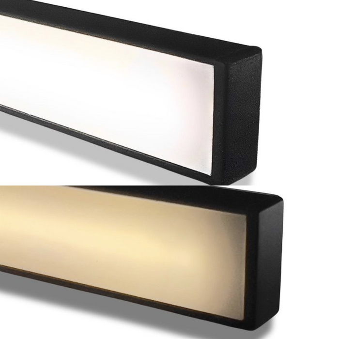 Black LED light channel end caps showing cool white and warm light glow