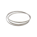 Diamond band saw blade—coiled metal band in a loop