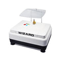 Inland Wizard IV Grinder with transparent guard and white base, top work surface
