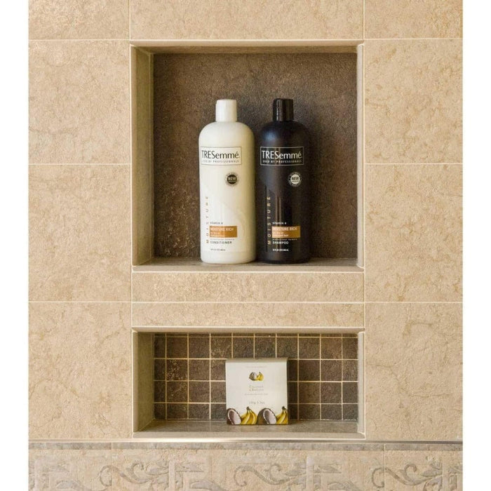 Shower niche installation view with two open compartments on tiled wall
