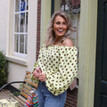 Off shoulder top stippen geel