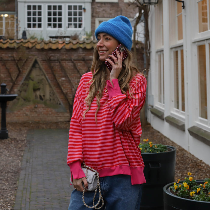 Oversized streep sweater roze rood