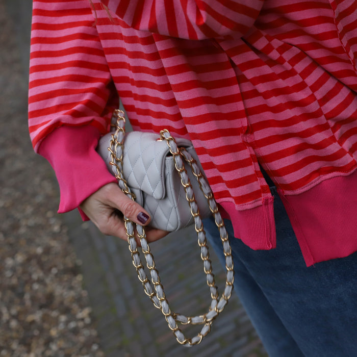 Oversized streep sweater roze rood
