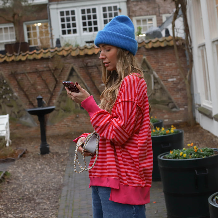 Oversized streep sweater roze rood