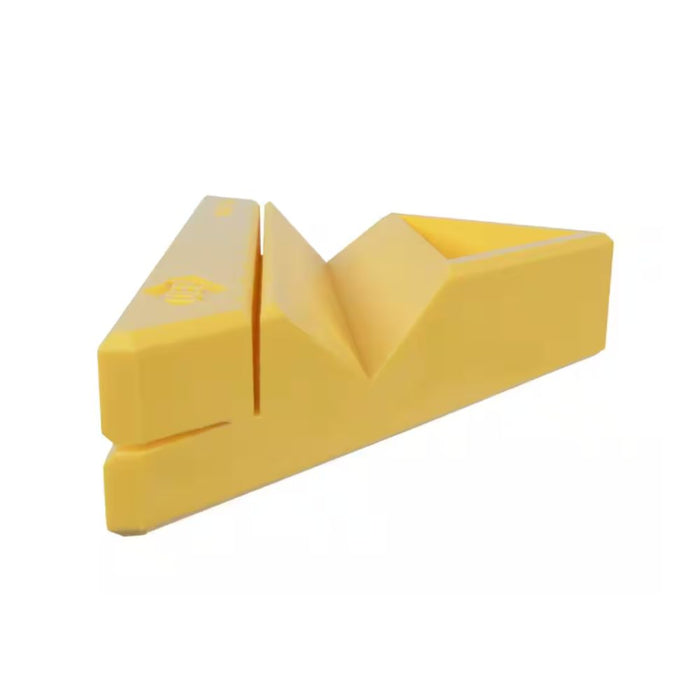 Yellow square tile trim piece with V-notch detail and side profile
