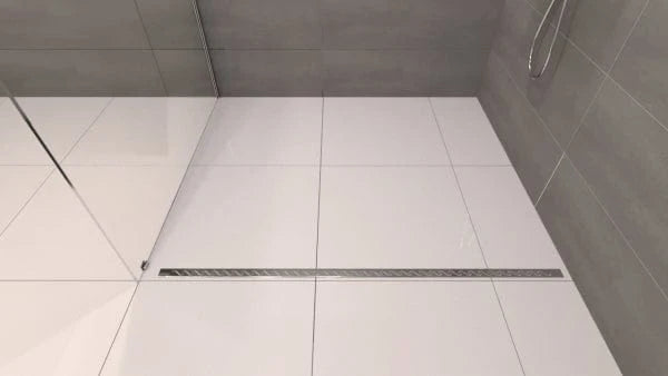 Linear drain kit channel for tile floor with metal grate strip