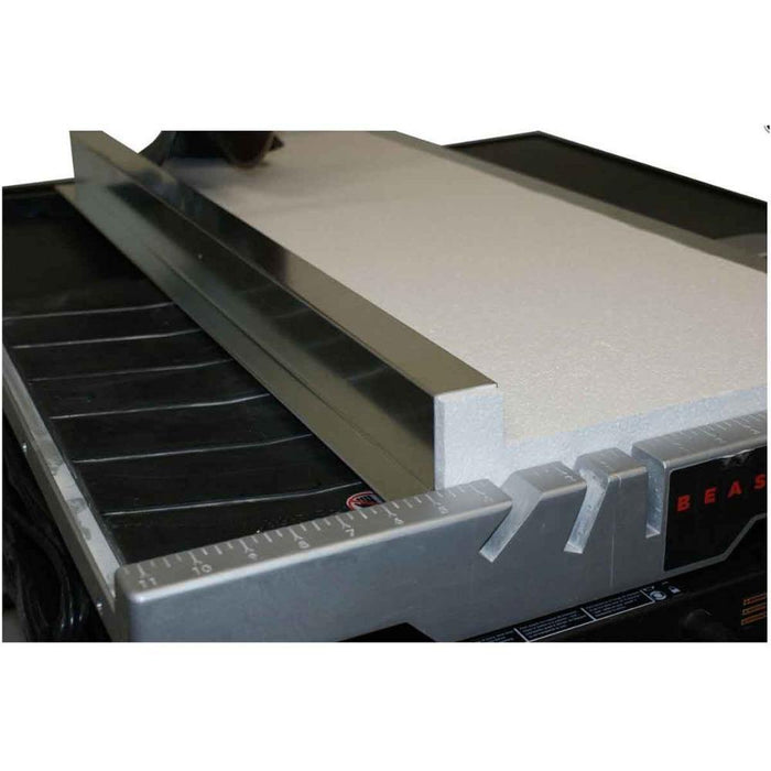 Wet saw rip table guide rails over work surface