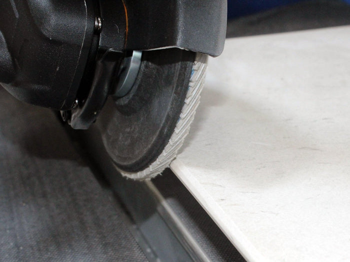 Diamond Flap Disc – close-up of flap edge on angle grinder, dark abrasive surface