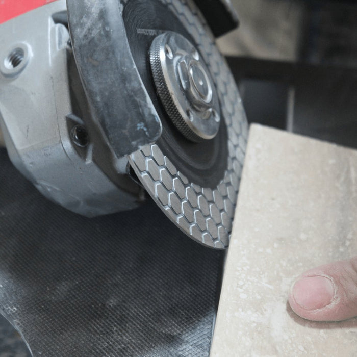 E-Z Miter 5 in cutting disc grinding tile edge on an angle grinder