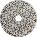 Hybrid polishing pad backing with geometric pattern and central mounting hole