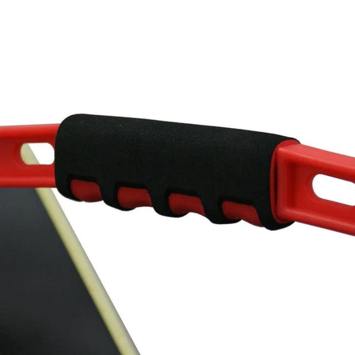 Close-up of black comfort grip on red replacement bucket handle