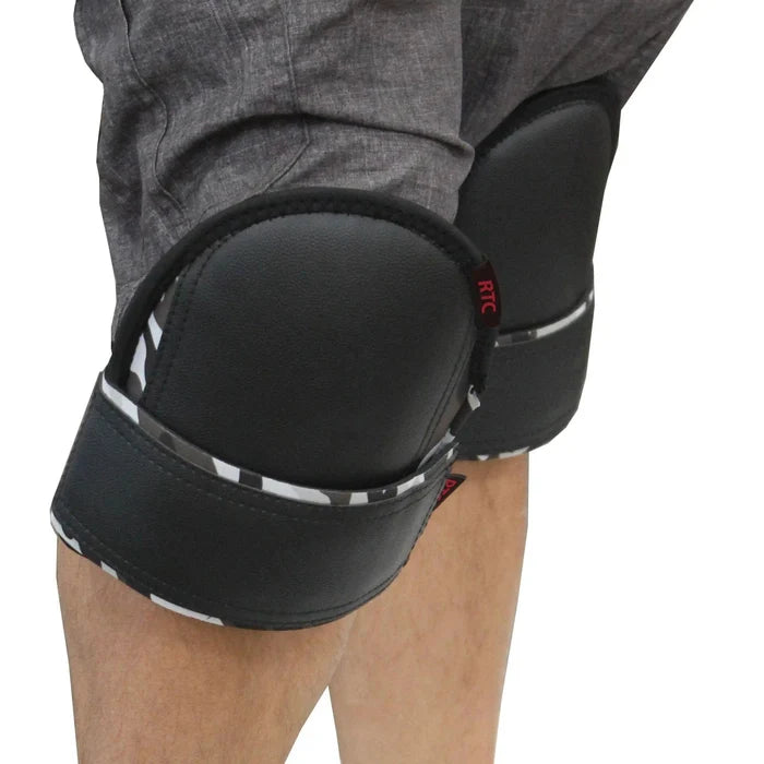 Black leather knee pads with camo wrap band and metal buckle