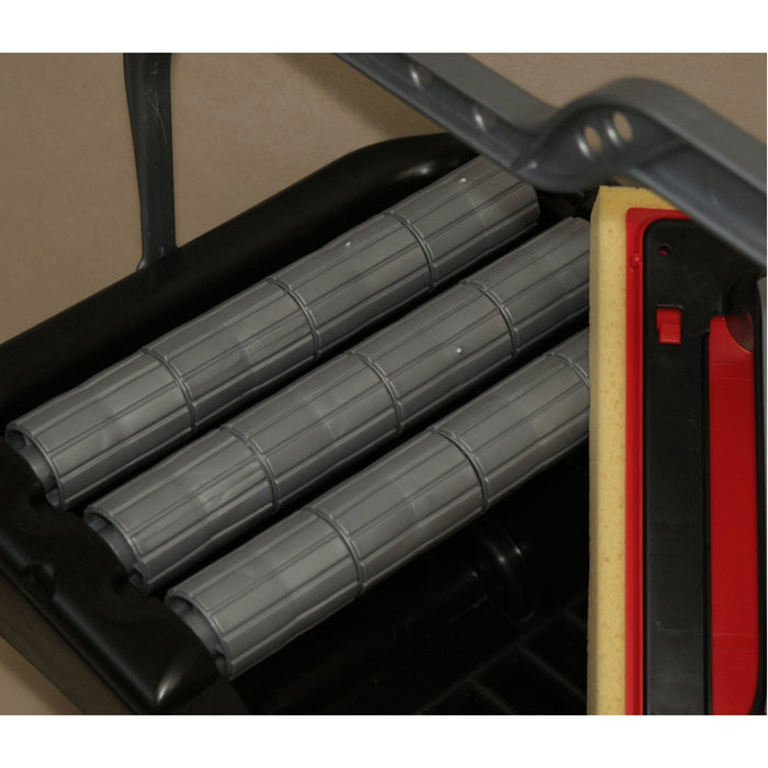 Rockin Roller scrub roller head with gray rollers and red/yellow cleaning insert