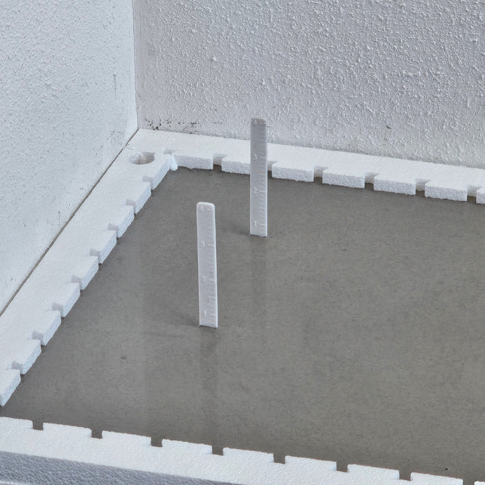 RTC leveling pins used to map self-leveling underlayment depth