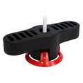 Torque Monster tool with white screw and black body, red base ring visible