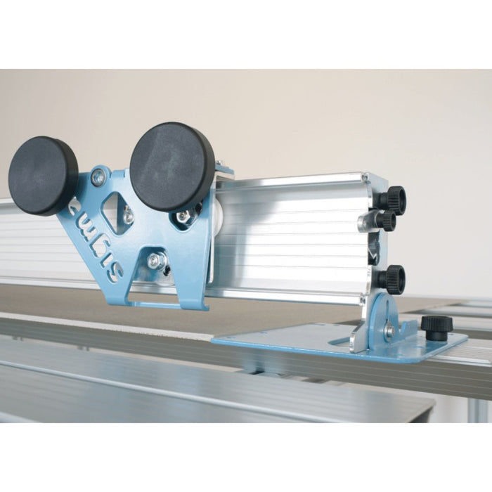 Rotating table support bracket with black knobs on mounting rails