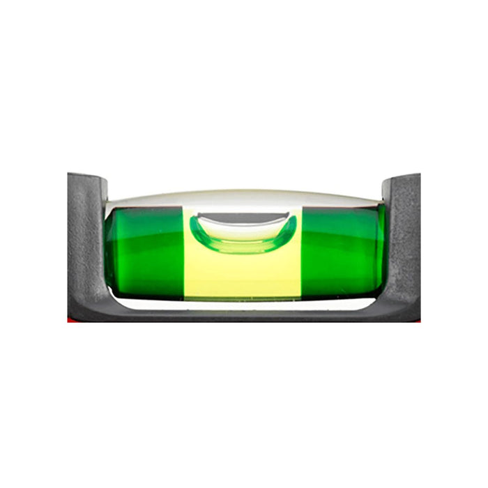 Close-up of green spirit vial in red box spirit level housing, amber reference vial
