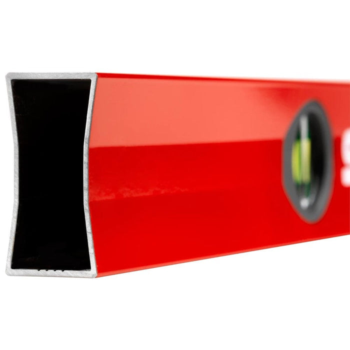 End-on view of red spirit level showing open black channel and side vial