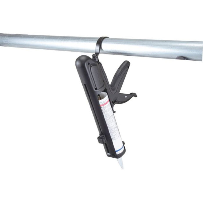 BC 100 applicator gun underside: side handle and cartridge body with label